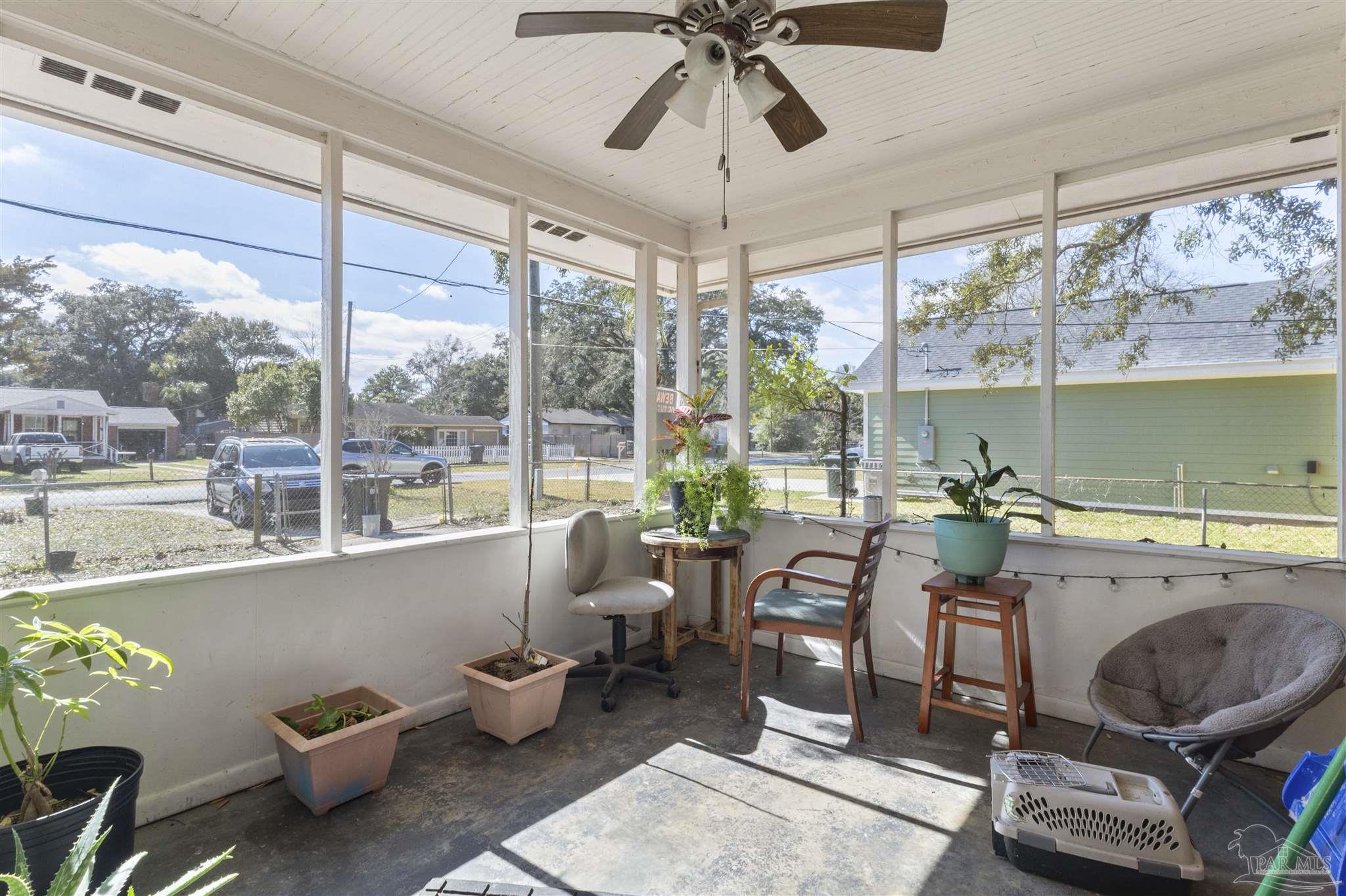 116 Rue Max Street Pensacola, FL 32507 - Photo 17 of 20 a room with furniture and a large window