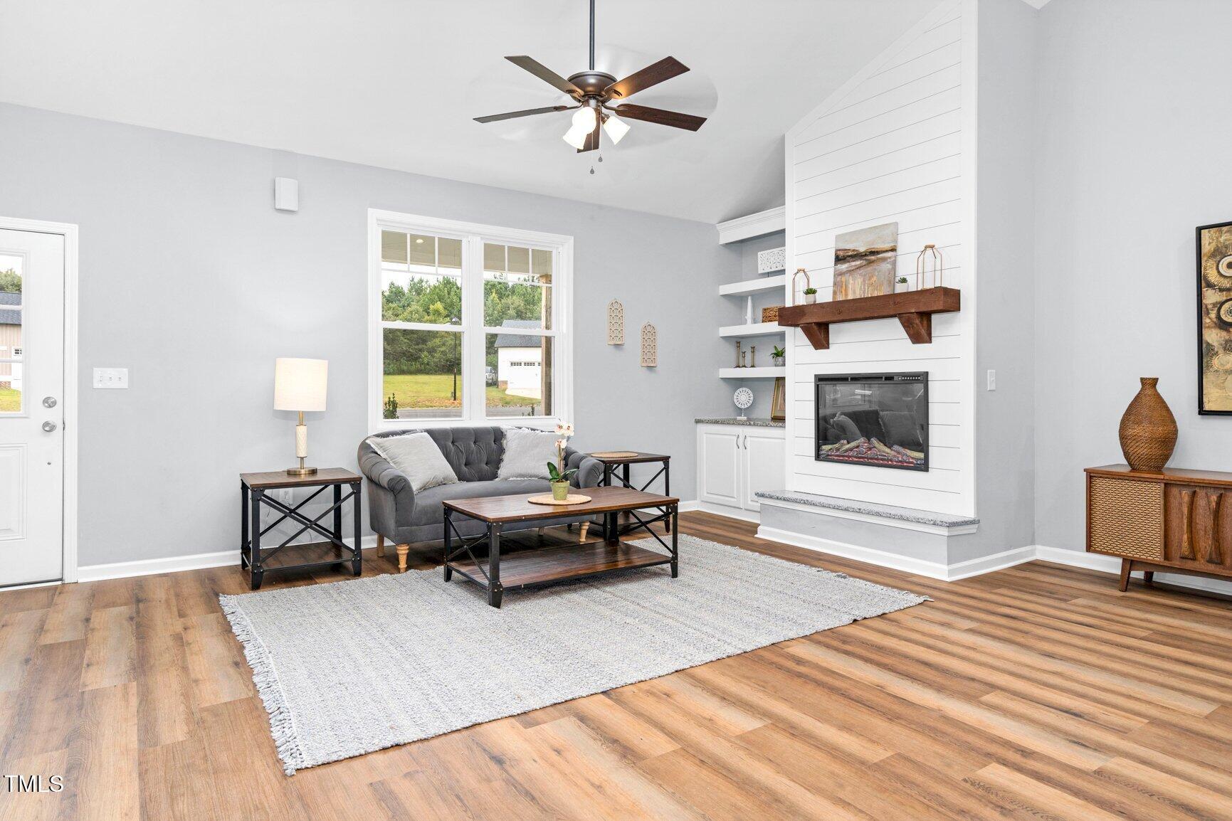 9506 South Beaver Crk Way Middlesex, NC 27557 - Photo 6 of 28 a living room with furniture and a window