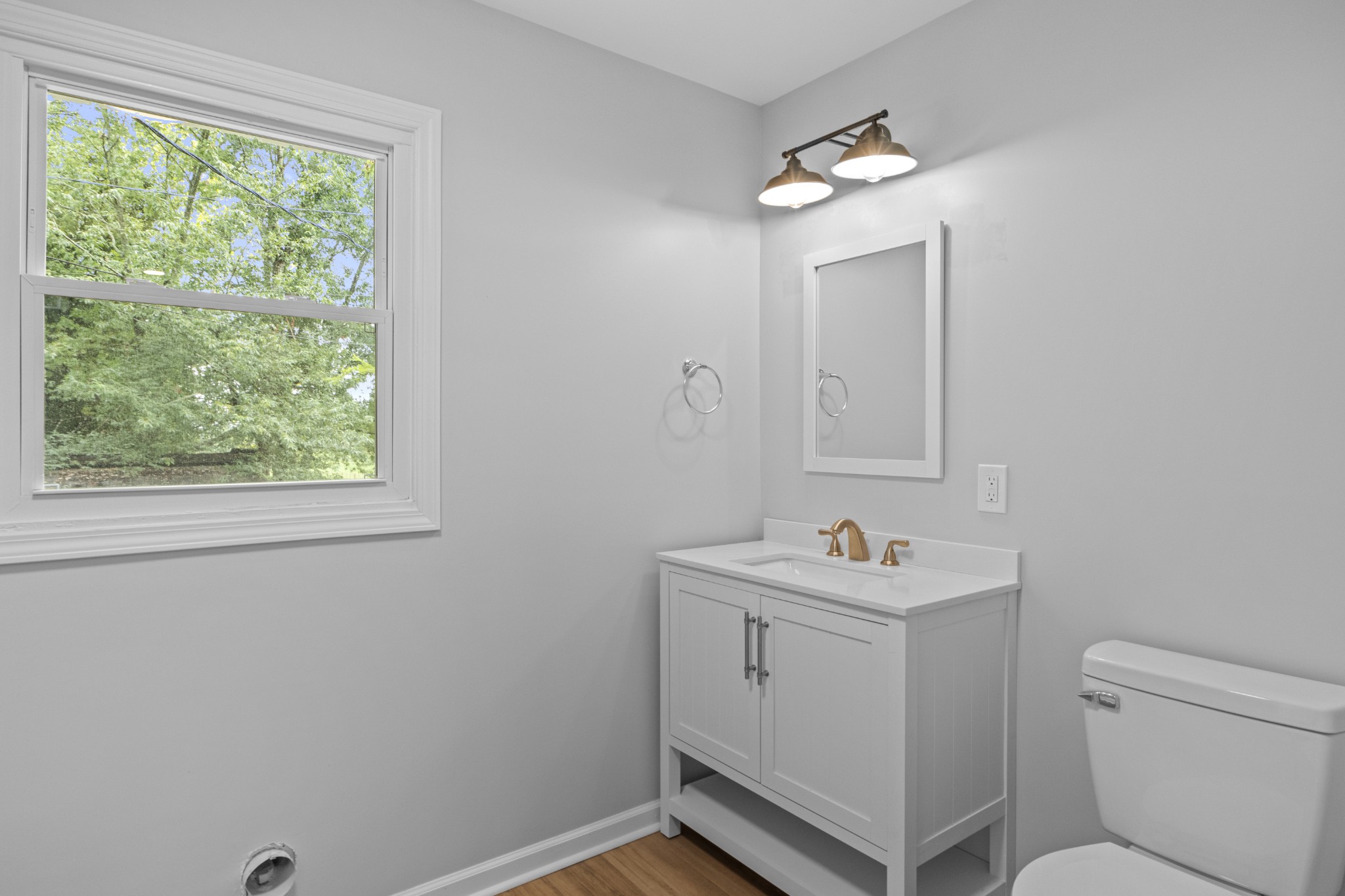 135 Hurricane Loop Tennessee Ridge, TN 37178 - Photo 13 of 29 a bathroom with a sink toilet and a mirror