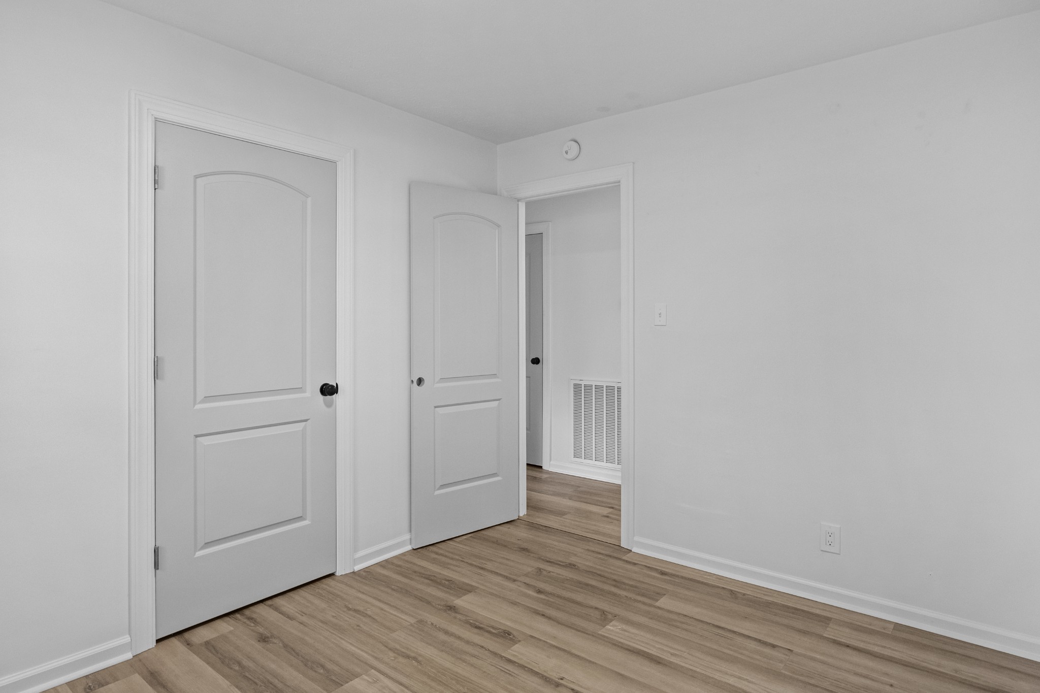 135 Hurricane Loop Tennessee Ridge, TN 37178 - Photo 17 of 29 a view of an empty room with wooden floor