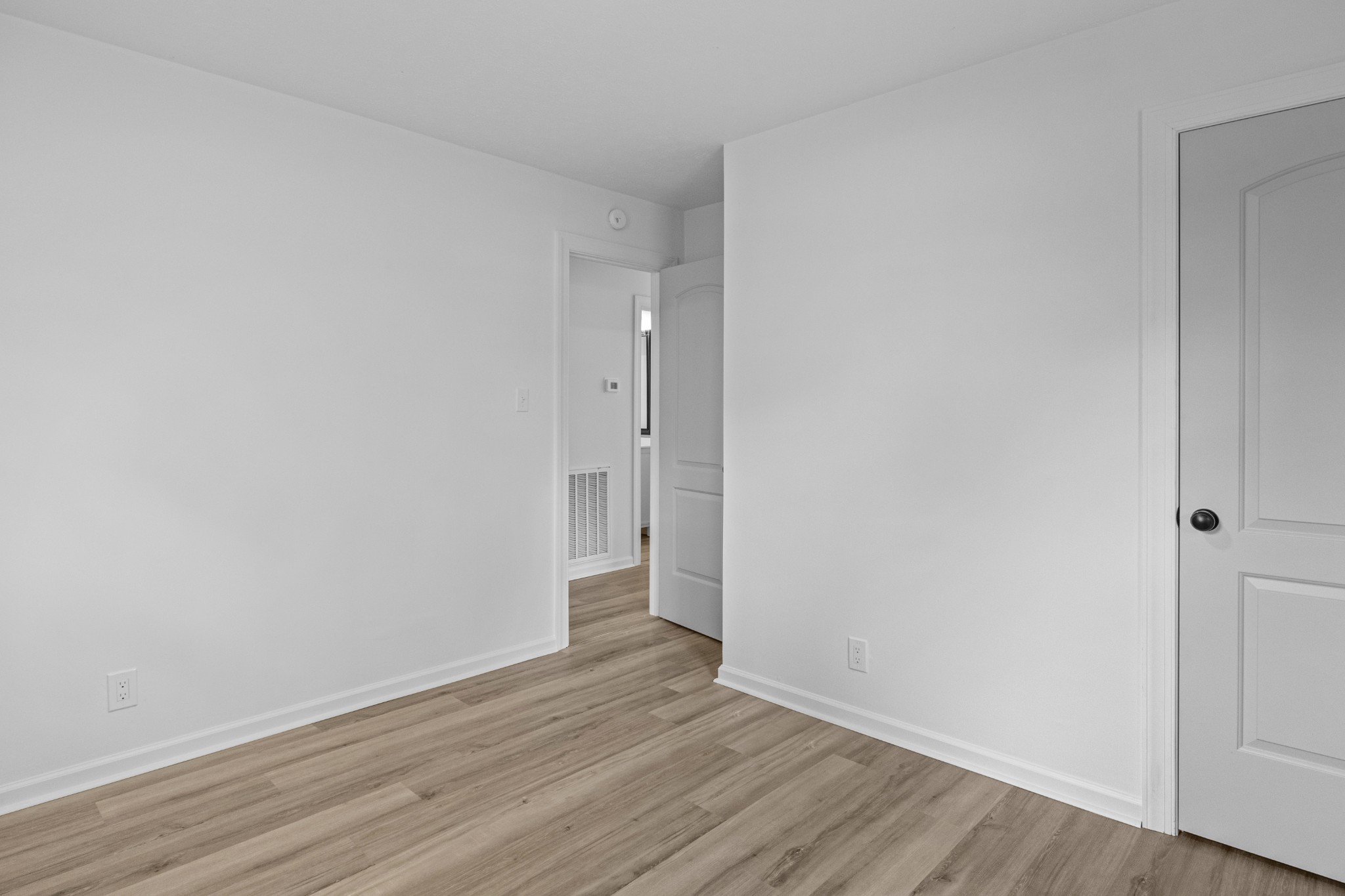 135 Hurricane Loop Tennessee Ridge, TN 37178 - Photo 19 of 29 a view of an empty room and wooden floor