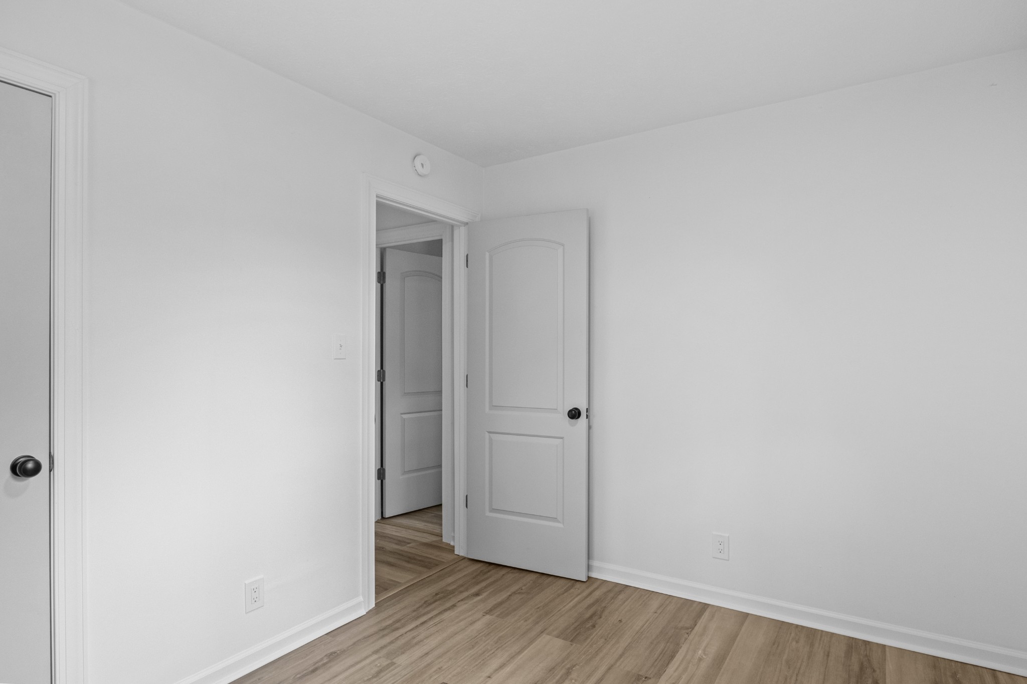 135 Hurricane Loop Tennessee Ridge, TN 37178 - Photo 21 of 29 a view of empty room with wooden floor