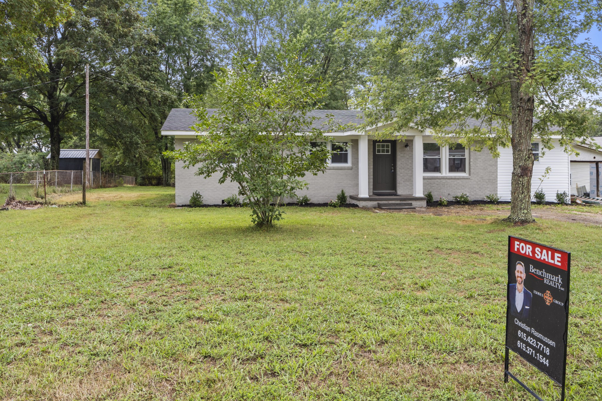 135 Hurricane Loop Tennessee Ridge, TN 37178 - Photo 25 of 29 a view of a house with a yard and sitting area