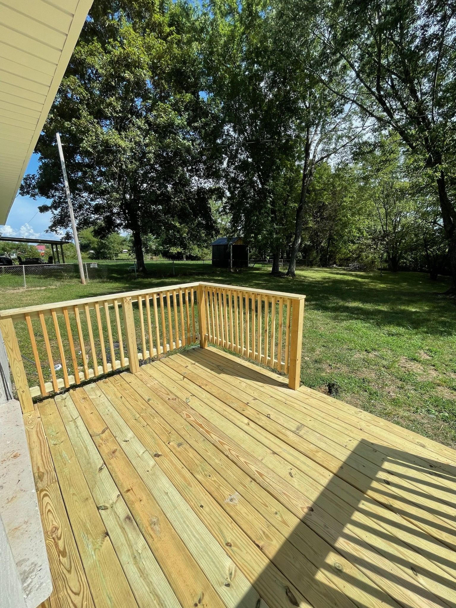 135 Hurricane Loop Tennessee Ridge, TN 37178 - Photo 28 of 29 a view of swimming pool with deck and yard