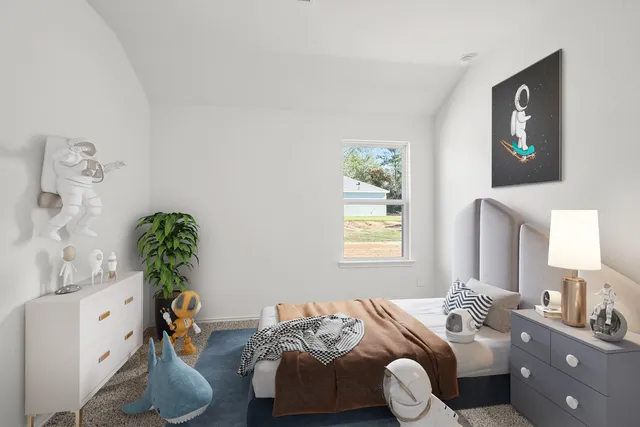 a bedroom with furniture and a bed