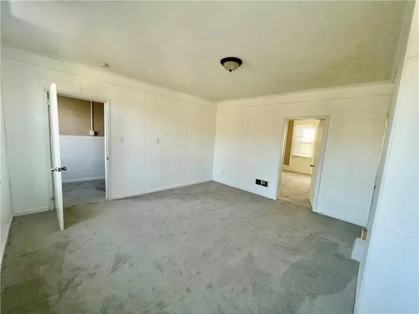 an empty room with a natural light