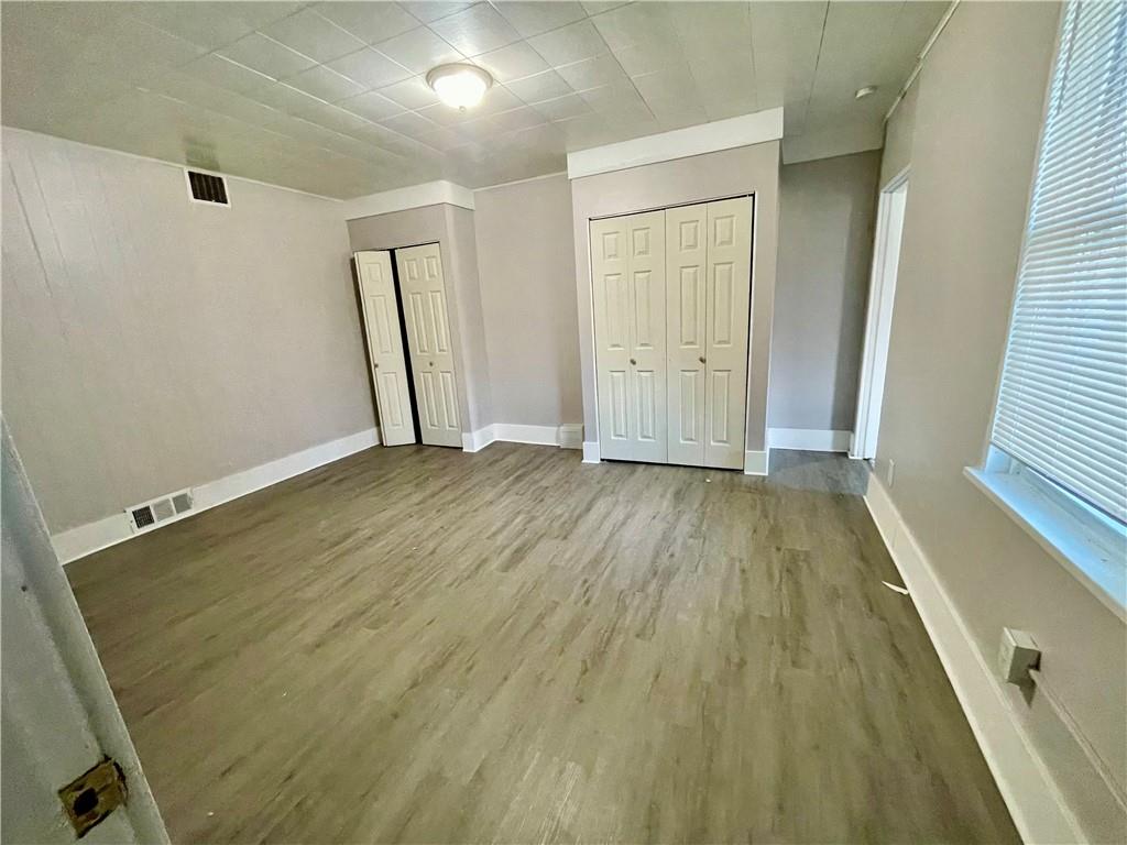 1104 Brabec Street Pittsburgh, PA 15212 - Photo 21 of 26 wooden floor in an empty room