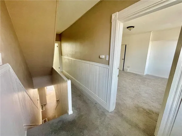 a view of hallway with stairs