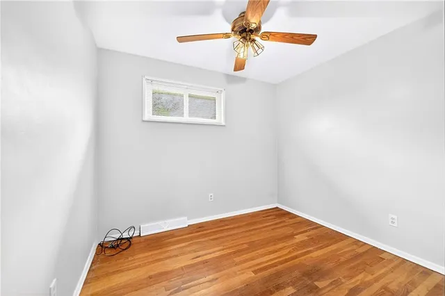 a view of a room with a fan