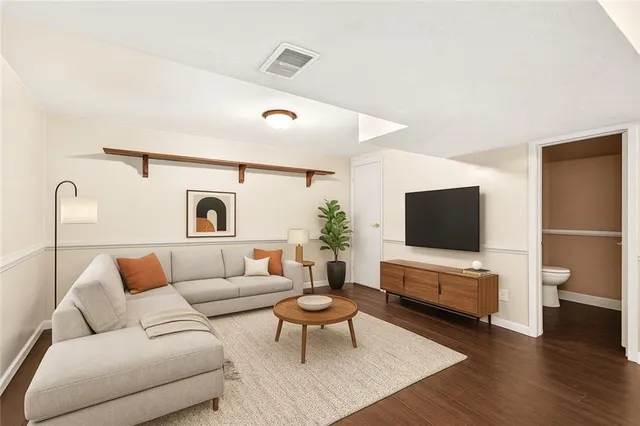 a view of a livingroom with wooden floor