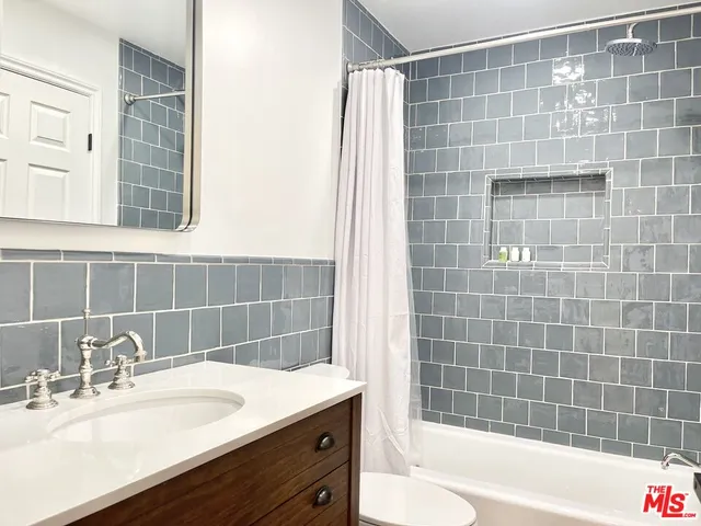 a bathroom with a sink and a bathtub