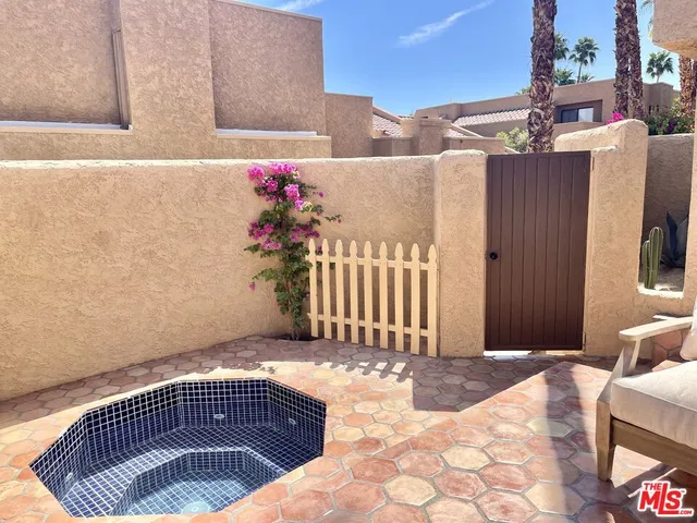 a view of a house with a patio
