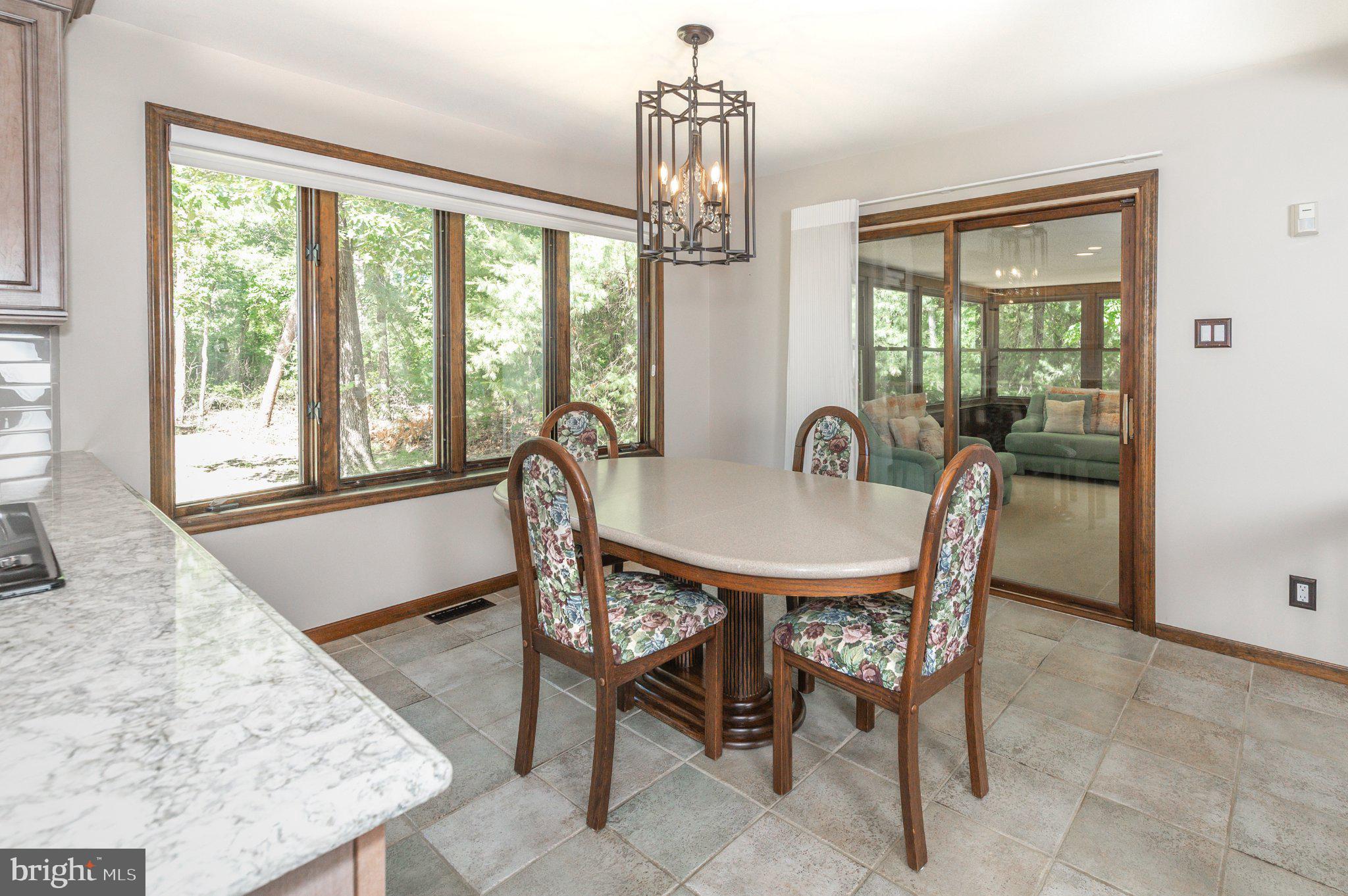 434 4th Street Atco, NJ 08004 - Photo 11 of 69 a view of a dining room with furniture window and outside view