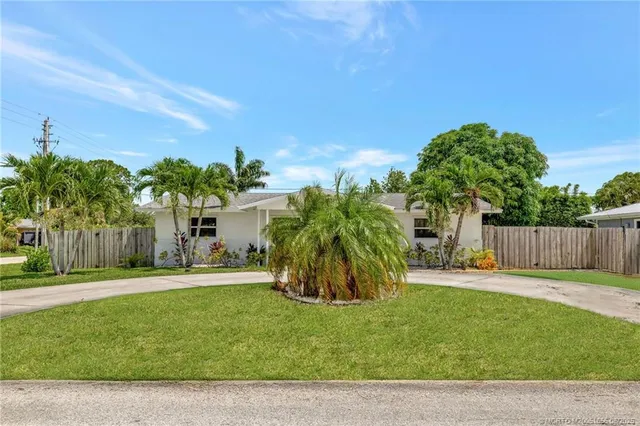 a view of a backyard with a garden