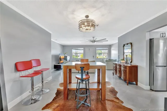 a view of a dining room with furniture