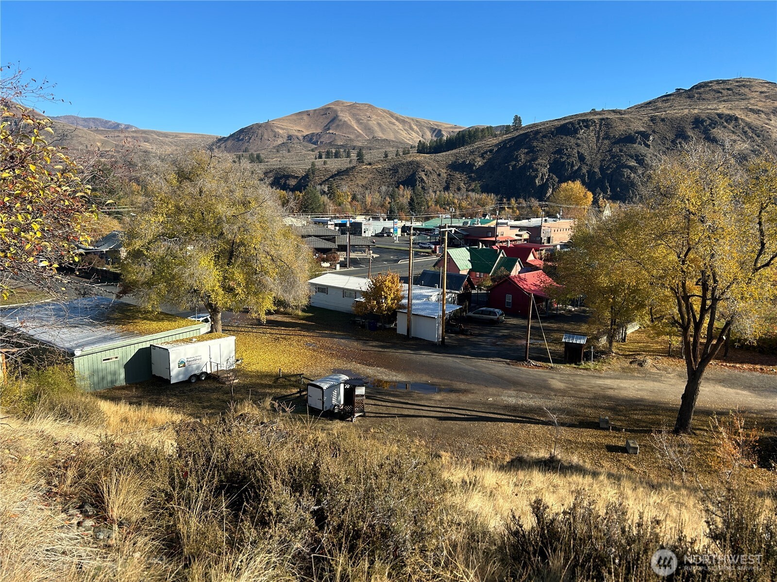 136 Johnson Street Twisp, WA 98856 - Photo 11 of 33 a view of a town with mountains in the background