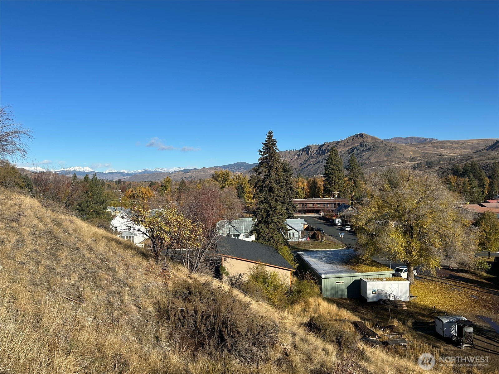 136 Johnson Street Twisp, WA 98856 - Photo 13 of 33 a view of a town with mountains in the background