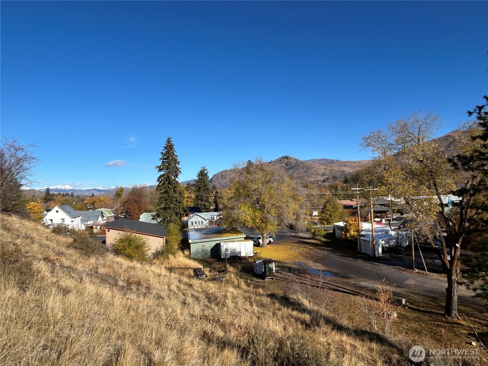 136 Johnson Street Twisp, WA 98856 - Photo 9 of 33 a view of city view and car parked on the roadside