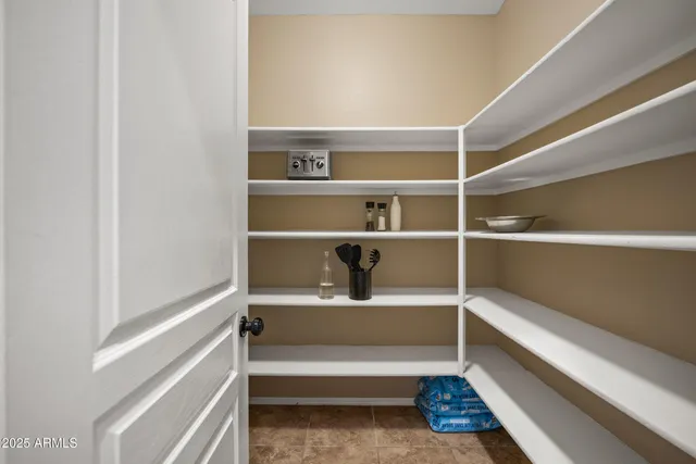 a kitchen with a refrigerator stove and microwave