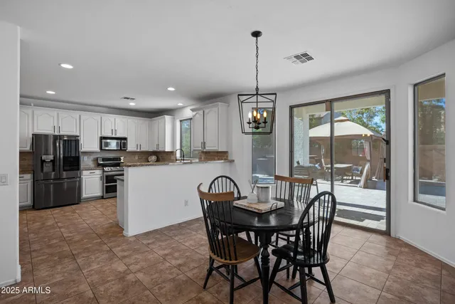 a bathroom with a toilet a sink and a mirror