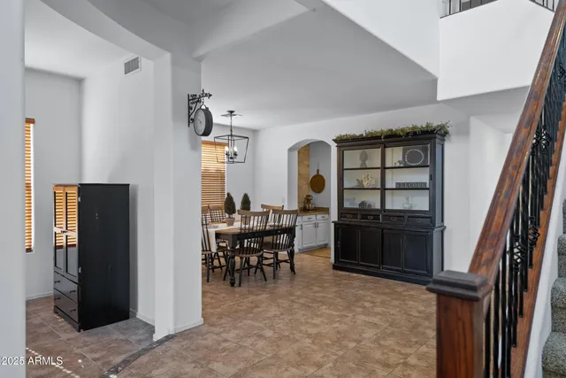 a view of a dining room with furniture window and outside view