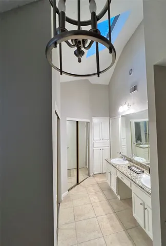 a view of a kitchen with a sink