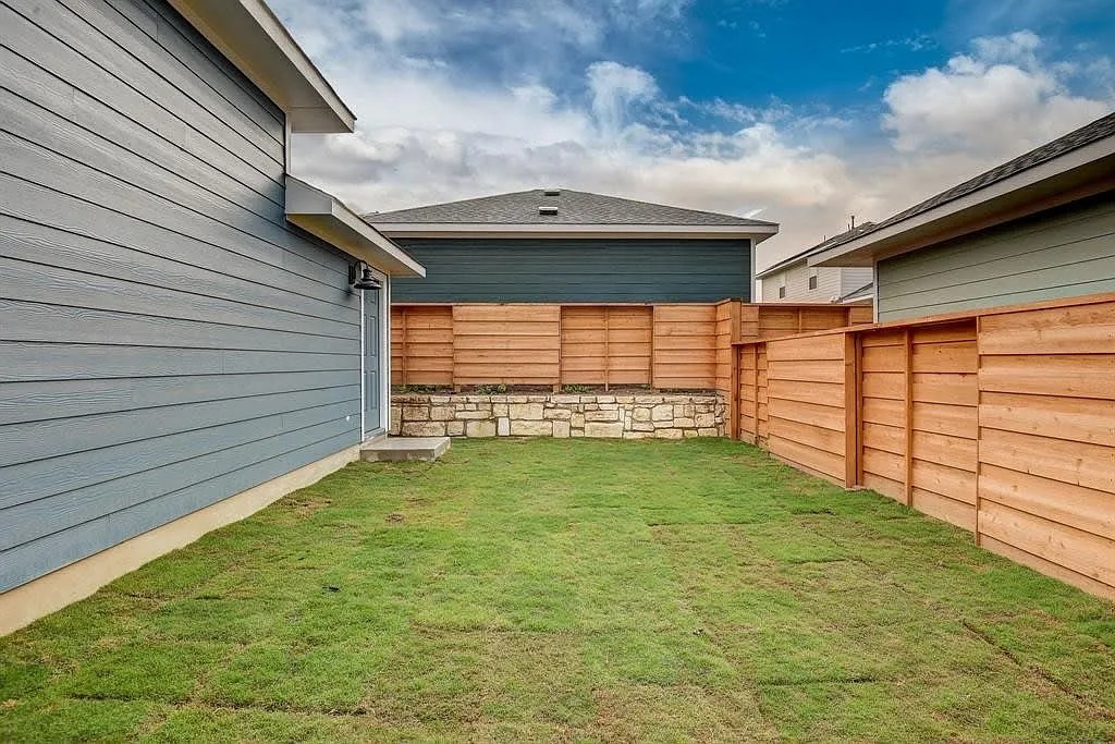 171 Santa Julia Kyle, TX 78640 - Photo 13 of 18 View of fenced backyard