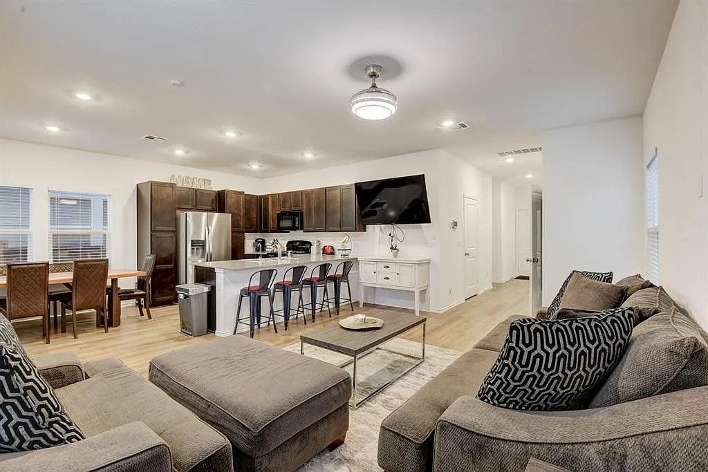 171 Santa Julia Kyle, TX 78640 - Photo 17 of 18 Living area featuring light wood-style floors and recessed lighting
