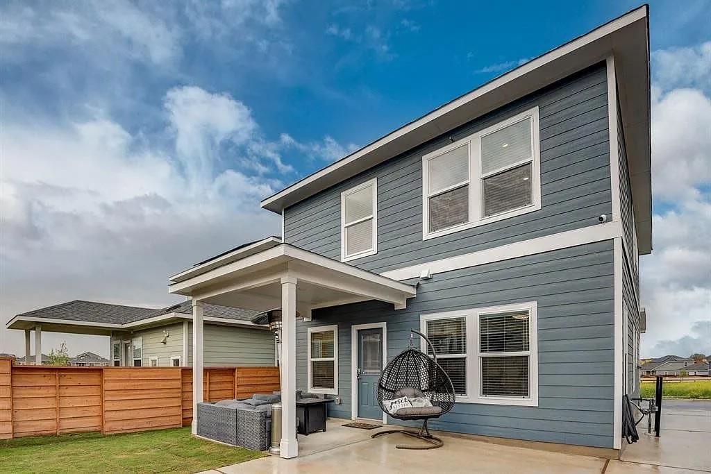 171 Santa Julia Kyle, TX 78640 - Photo 2 of 18 Back of property with a patio area