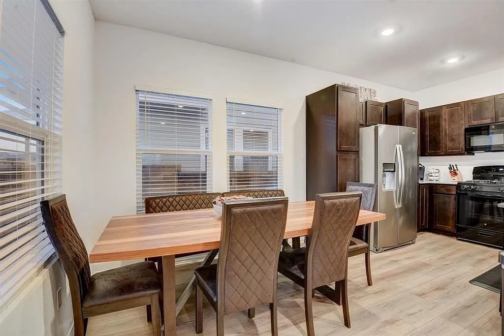 171 Santa Julia Kyle, TX 78640 - Photo 6 of 18 Dining room with light wood-type flooring