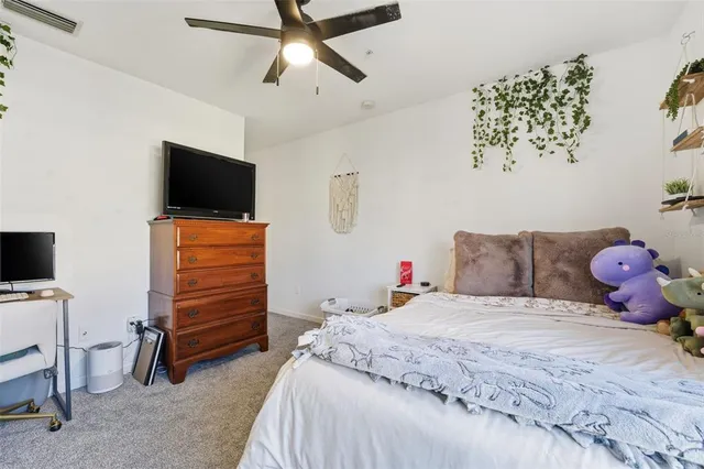 a view of hallway with livingroom