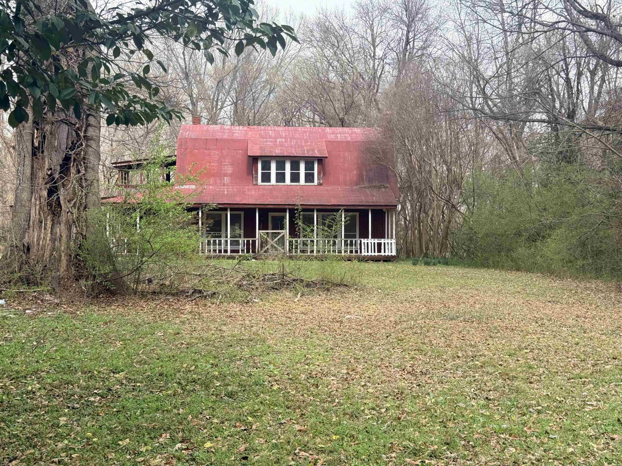 890 Craft Road Memphis, TN 38116 - Photo 2 of 15 a front view of a house with a garden