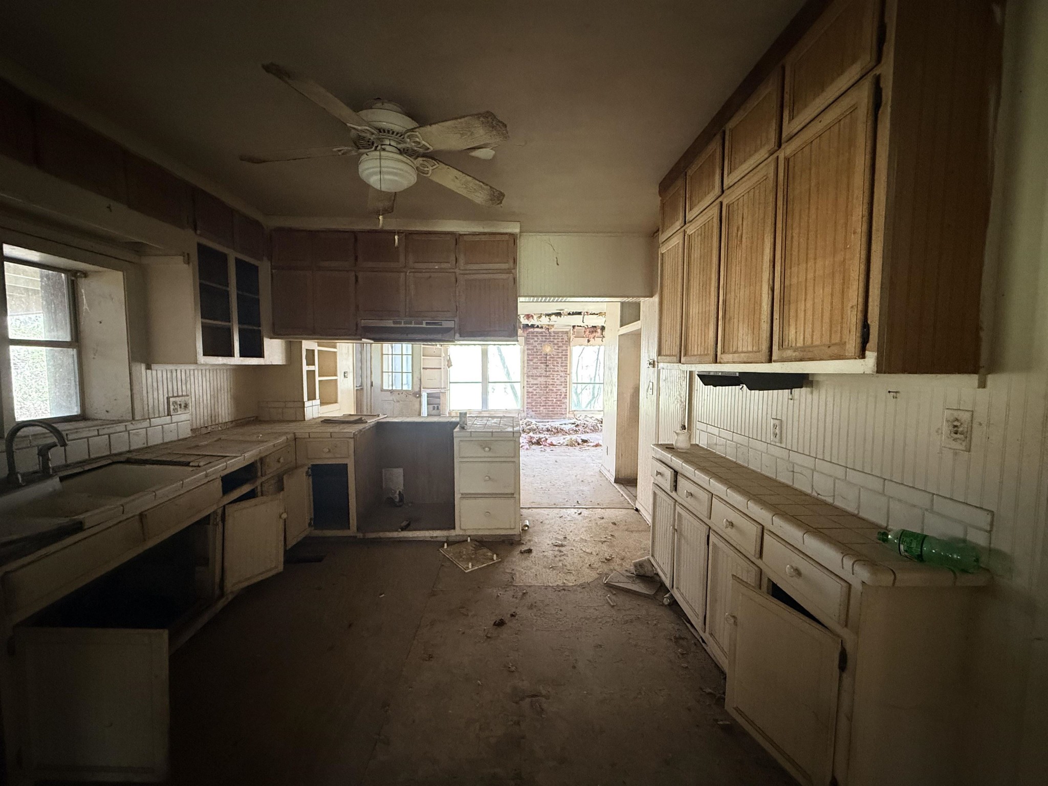 890 Craft Road Memphis, TN 38116 - Photo 5 of 15 a kitchen with stainless steel appliances granite countertop a stove a sink and a refrigerator