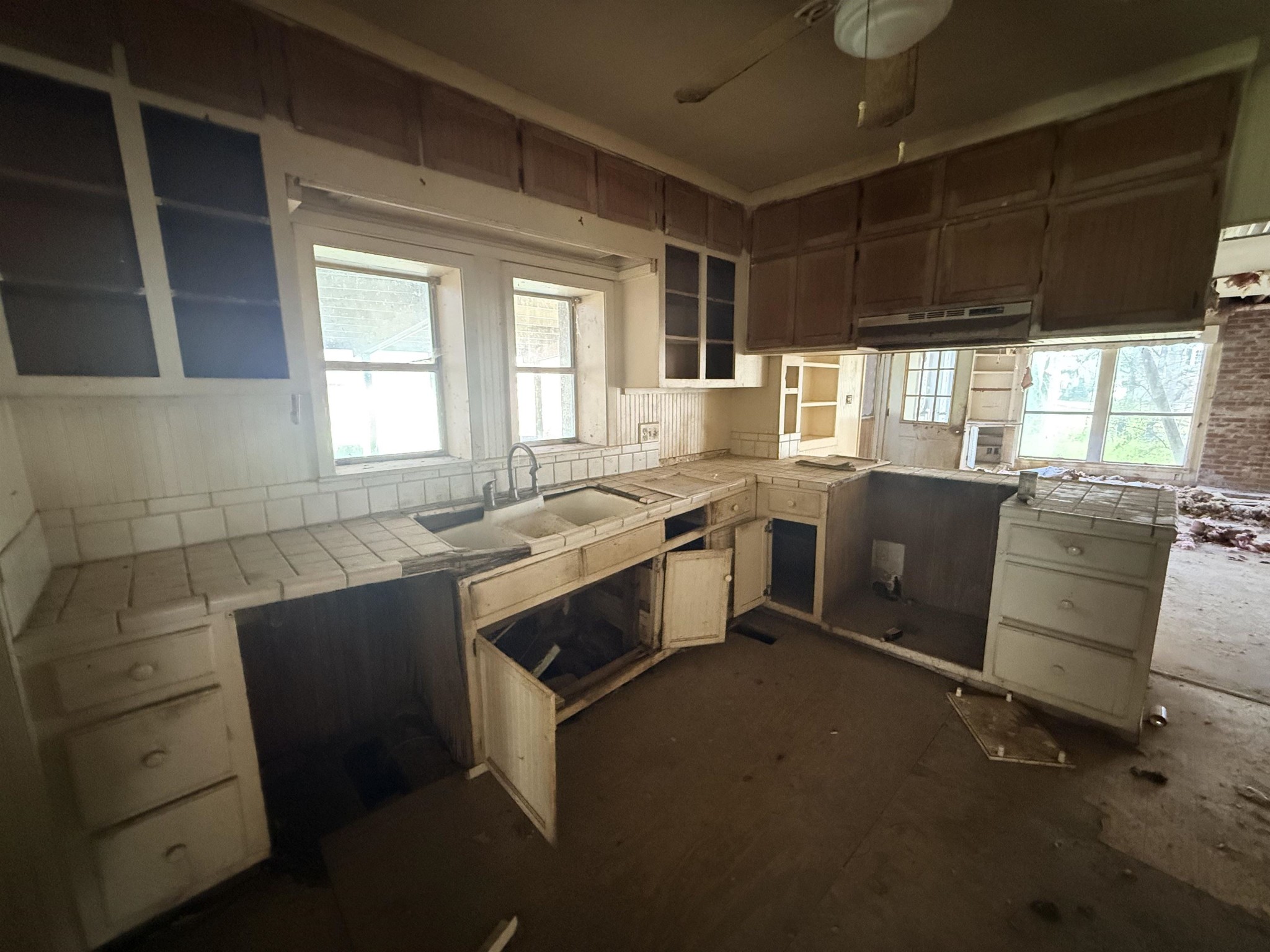 890 Craft Road Memphis, TN 38116 - Photo 6 of 15 a kitchen with a sink cabinets and window