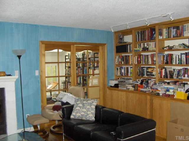 63 Stoneridge Road Durham, NC 27705 - Photo 4 of 9 a living room with furniture and a window