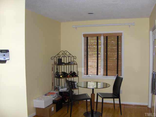 63 Stoneridge Road Durham, NC 27705 - Photo 6 of 9 a dining room with furniture and window