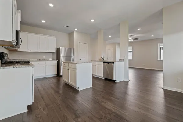 a view of kitchen with wooden floor