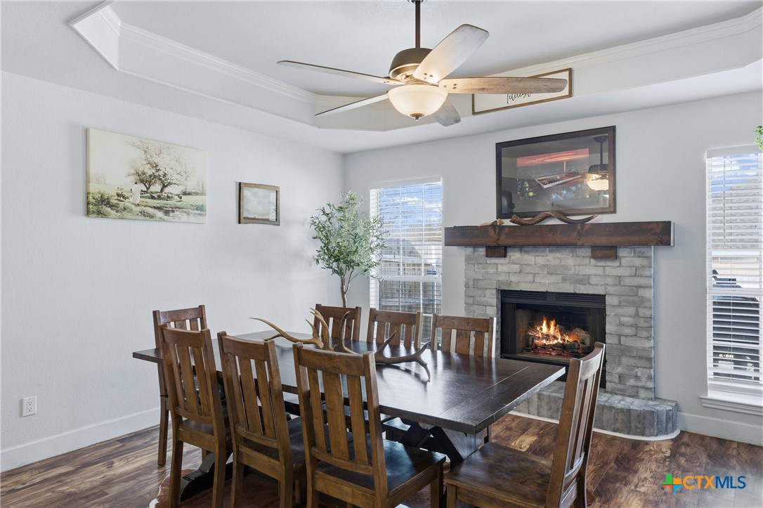 1601 Citation Loop Harker Heights, TX 76548 - Photo 12 of 42 a dining room with furniture and a fireplace