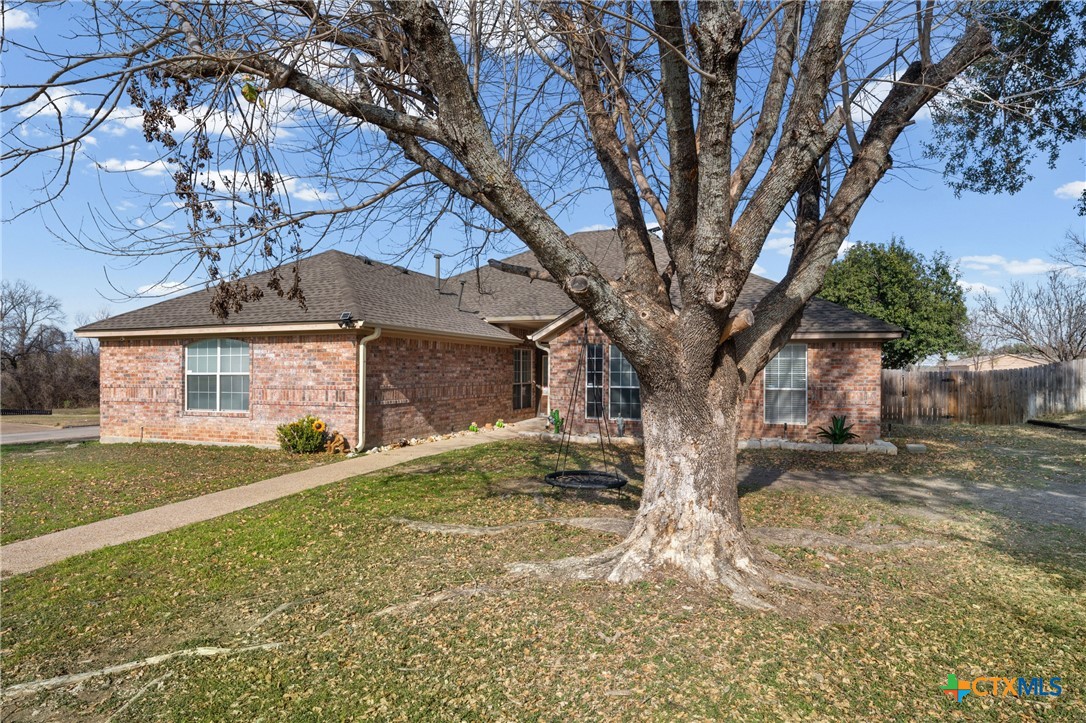 1601 Citation Loop Harker Heights, TX 76548 - Photo 2 of 42 a view of a yard in front of a house with large tree