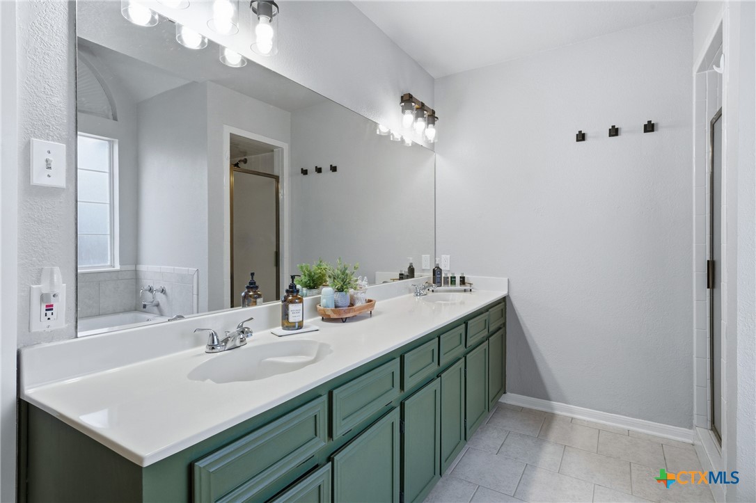 1601 Citation Loop Harker Heights, TX 76548 - Photo 33 of 42 a bathroom with a sink and a mirror
