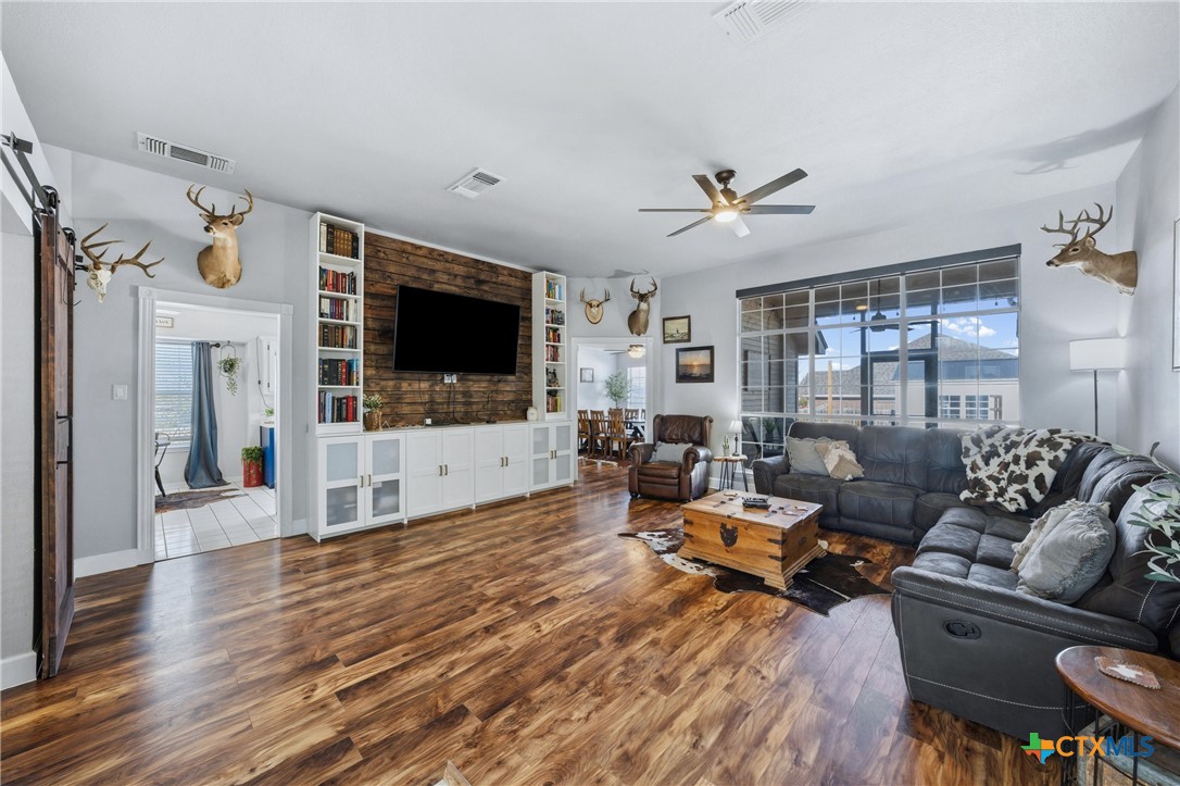 1601 Citation Loop Harker Heights, TX 76548 - Photo 5 of 42 a living room with furniture and a flat screen tv