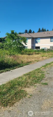 a view of a big yard next to a large building