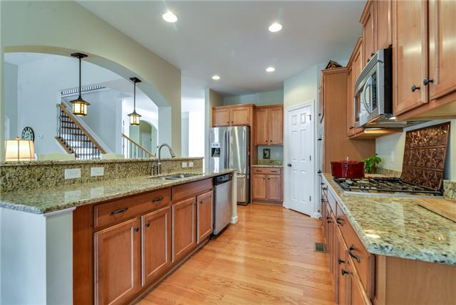 5535 Rathkeale Lane Franklin, TN 37067 - Photo 6 of 18 Grainite Countertops and Stainless Steel Appliances.