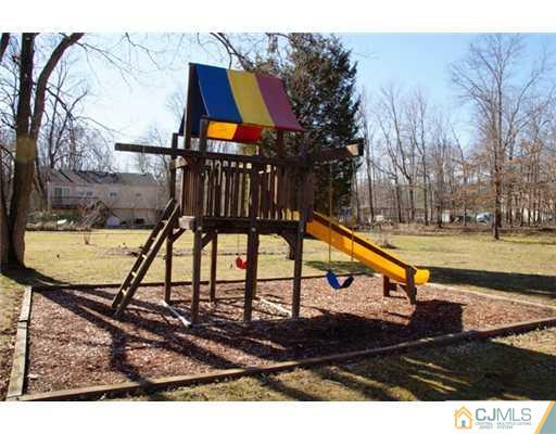 54 Poplar Road Piscataway, NJ 08854 - Photo 6 of 6 a view of swimming pool with a backyard