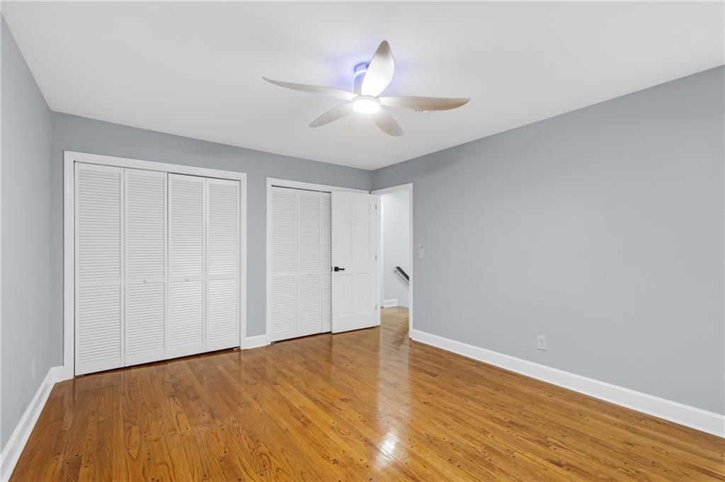 4373 Buckingham Circle Decatur, GA 30035 - Photo 13 of 40 a view of an empty room with wooden floor