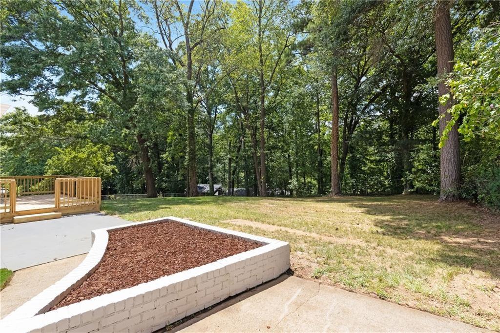 4373 Buckingham Circle Decatur, GA 30035 - Photo 20 of 40 a view of a swimming pool with a yard