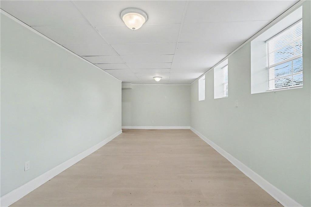 4373 Buckingham Circle Decatur, GA 30035 - Photo 27 of 40 an empty room with a empty space and windows