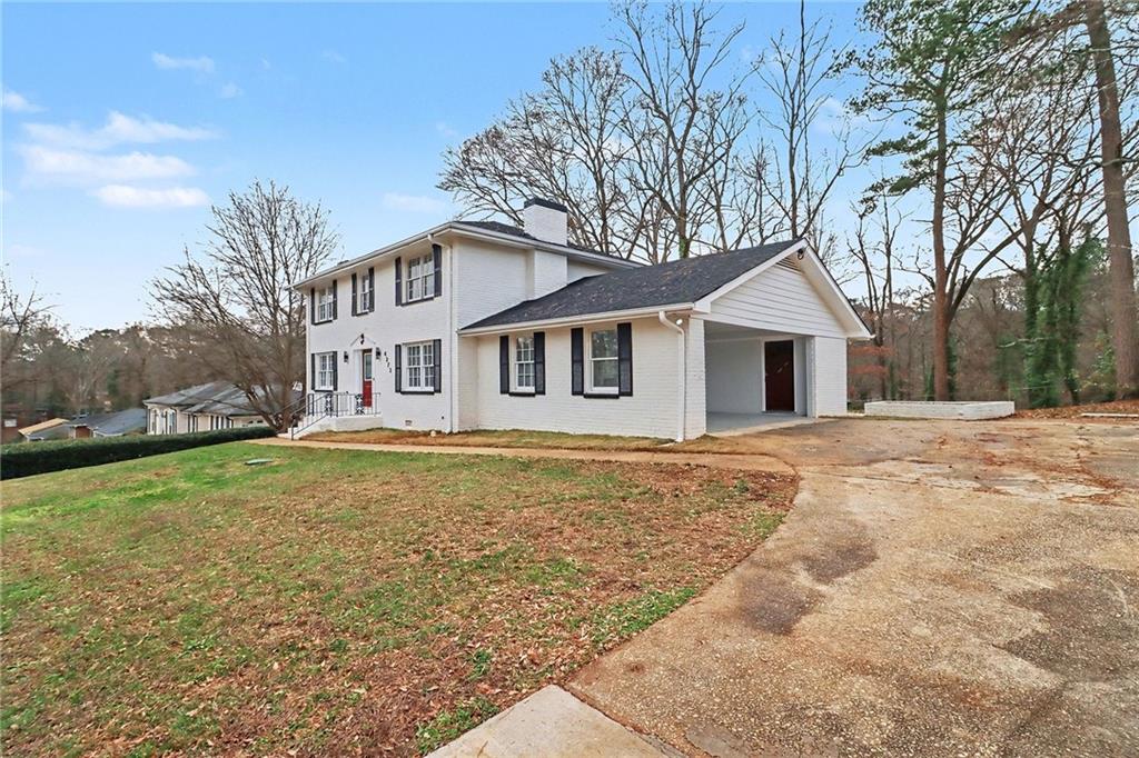 4373 Buckingham Circle Decatur, GA 30035 - Photo 31 of 40 a front view of a house with garden