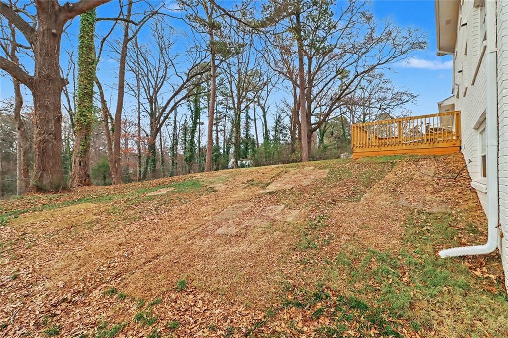 4373 Buckingham Circle Decatur, GA 30035 - Photo 32 of 40 a backyard of a house with trees