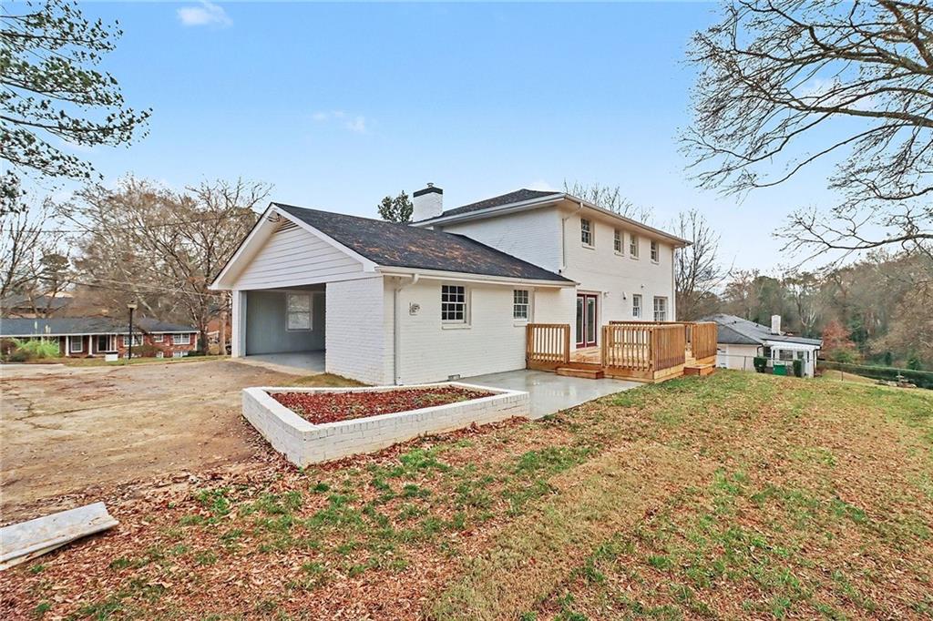 4373 Buckingham Circle Decatur, GA 30035 - Photo 34 of 40 a front view of a house with a yard